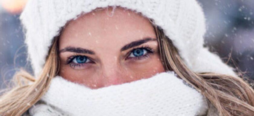 invierno y cuidado de los ojos: imagen de un mujer abrigada